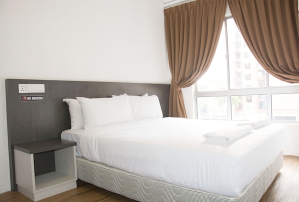 Family Deluxe Room | Iron/ironing board, free WiFi, bed sheets - Promenade Service Apartments (Kota Kinabalu)