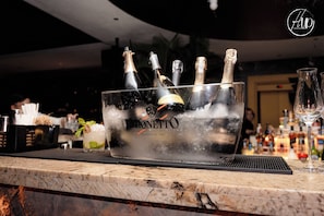 Rooftop bar, pool views, open daily