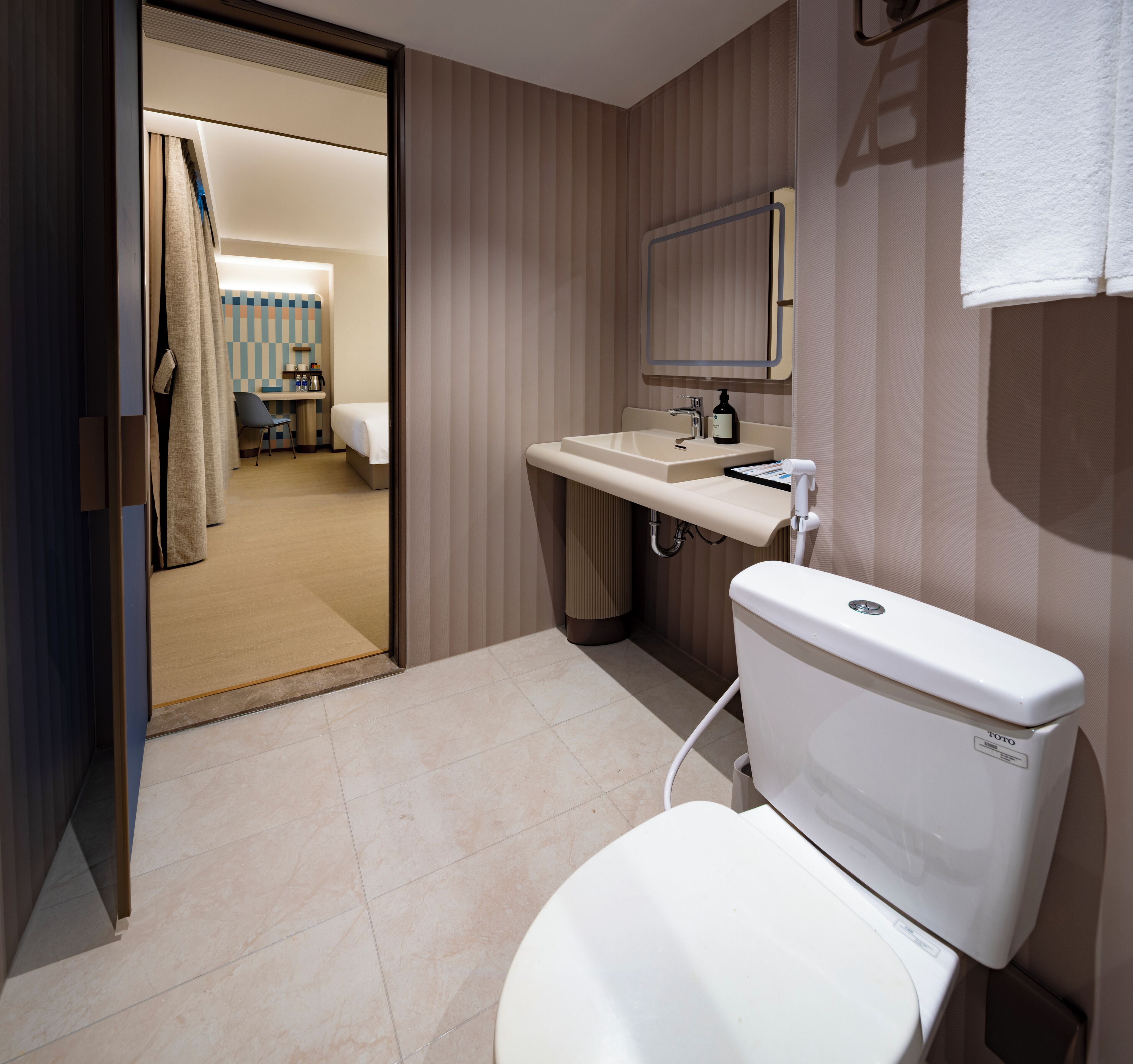 two bedroom king suite + breakfast + free minibar | bathroom | shower, rainfall showerhead, designer toiletries, hair dryer