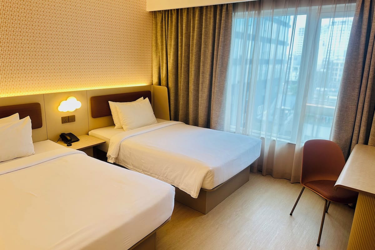 Deluxe Twin Room | Hypo-allergenic bedding, minibar, in-room safe, individually furnished