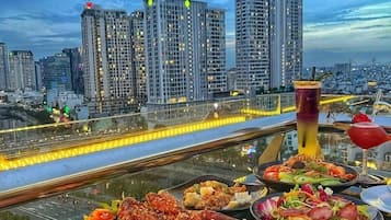 Rooftop bar, pool views, open daily