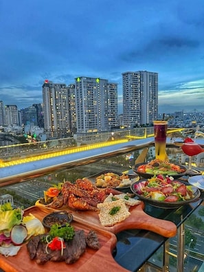 Rooftop bar, pool views, open daily