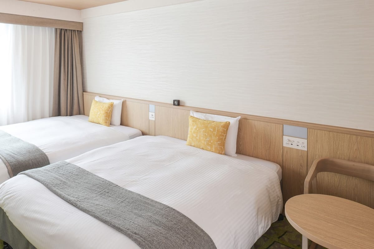 twin room, 2 queen beds, non smoking | down duvets, desk, laptop workspace, blackout curtains