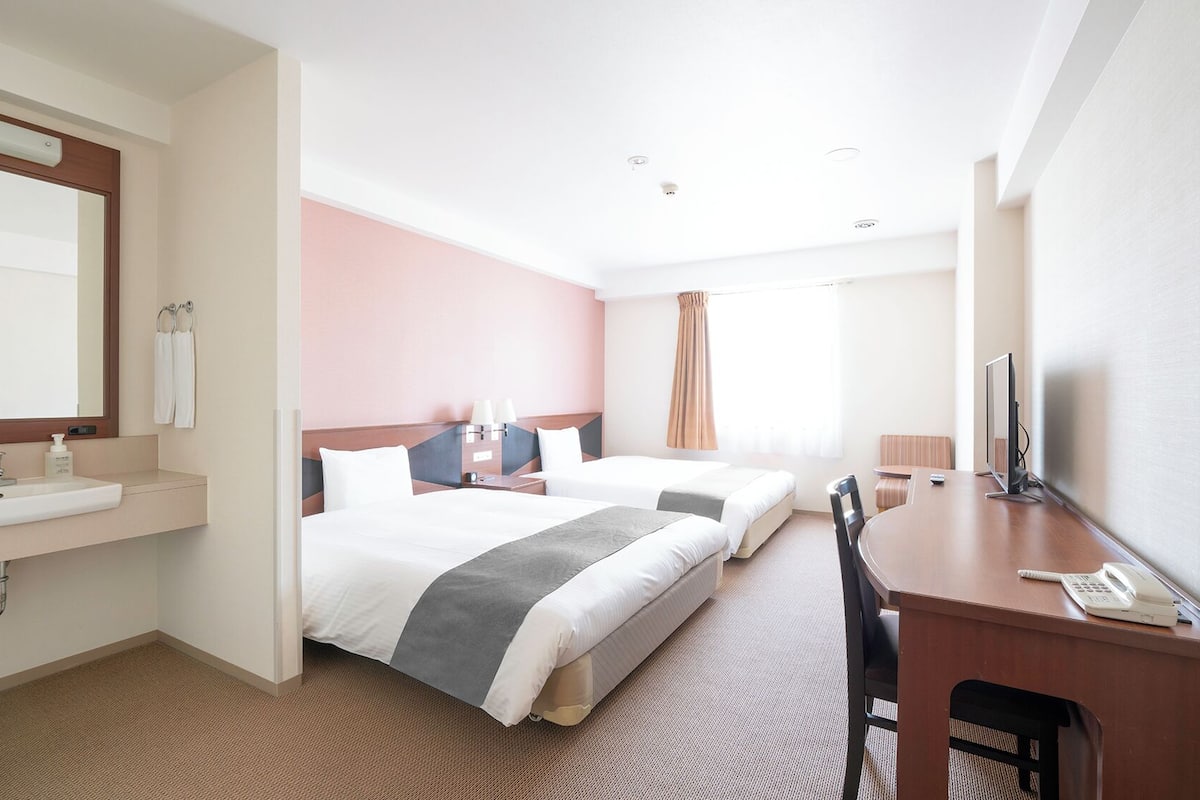 desk, laptop workspace, blackout curtains, iron/ironing board