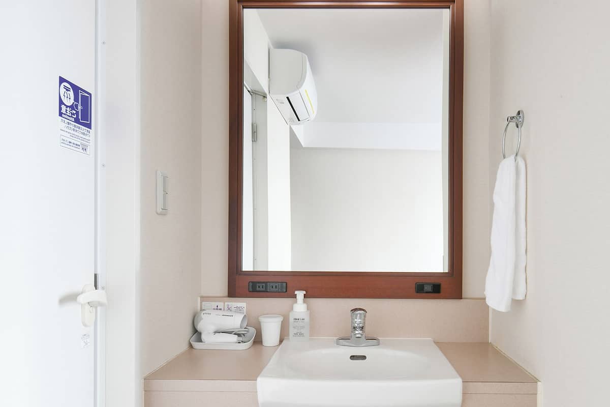 desk, laptop workspace, blackout curtains, iron/ironing board