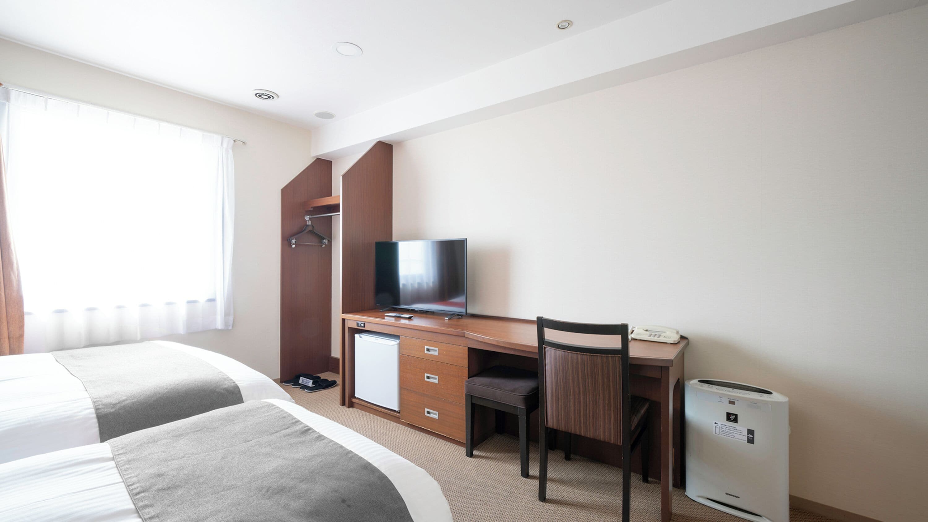 desk, laptop workspace, blackout curtains, iron/ironing board