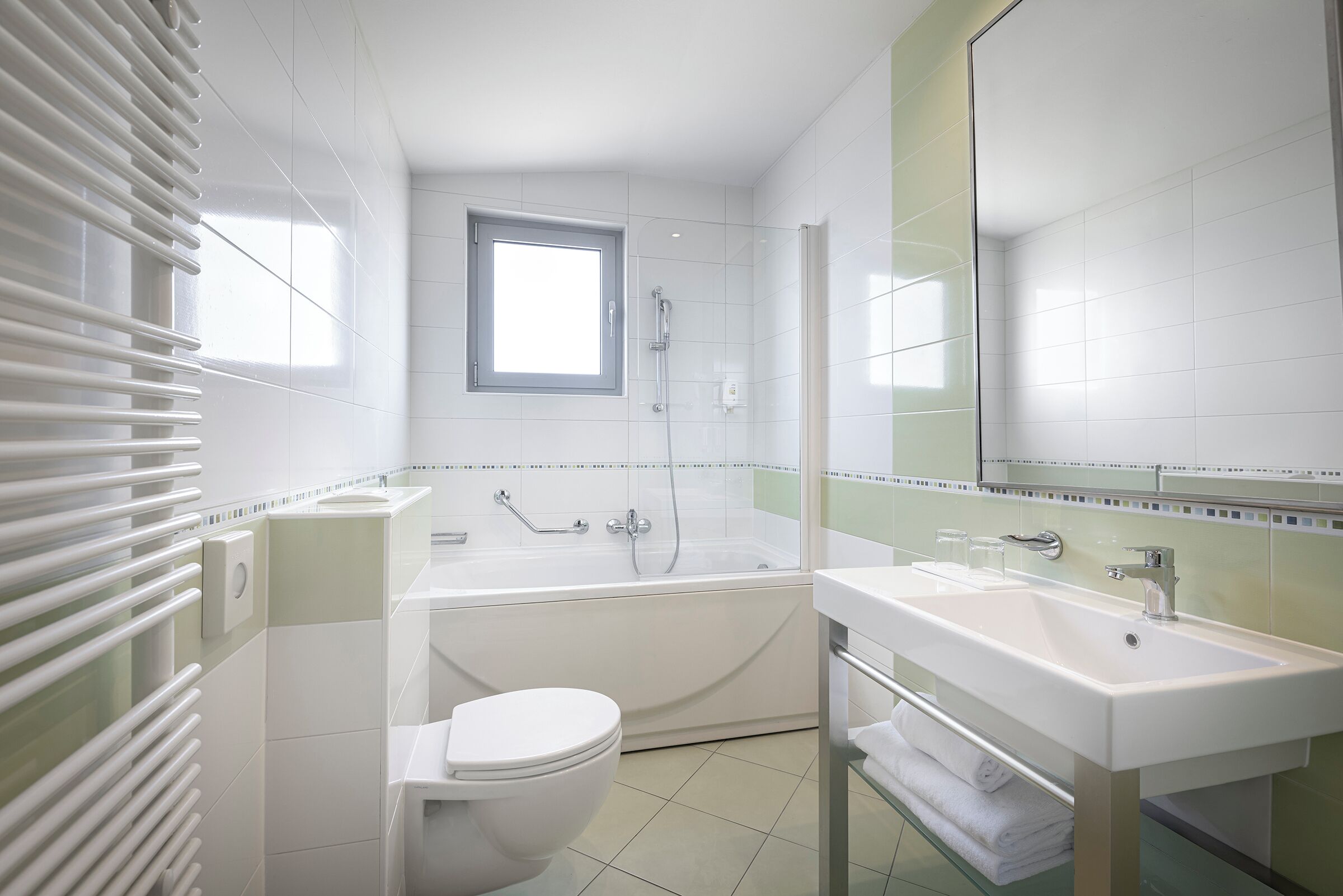 premium triple room, balcony | bathroom | free toiletries, hair dryer, towels