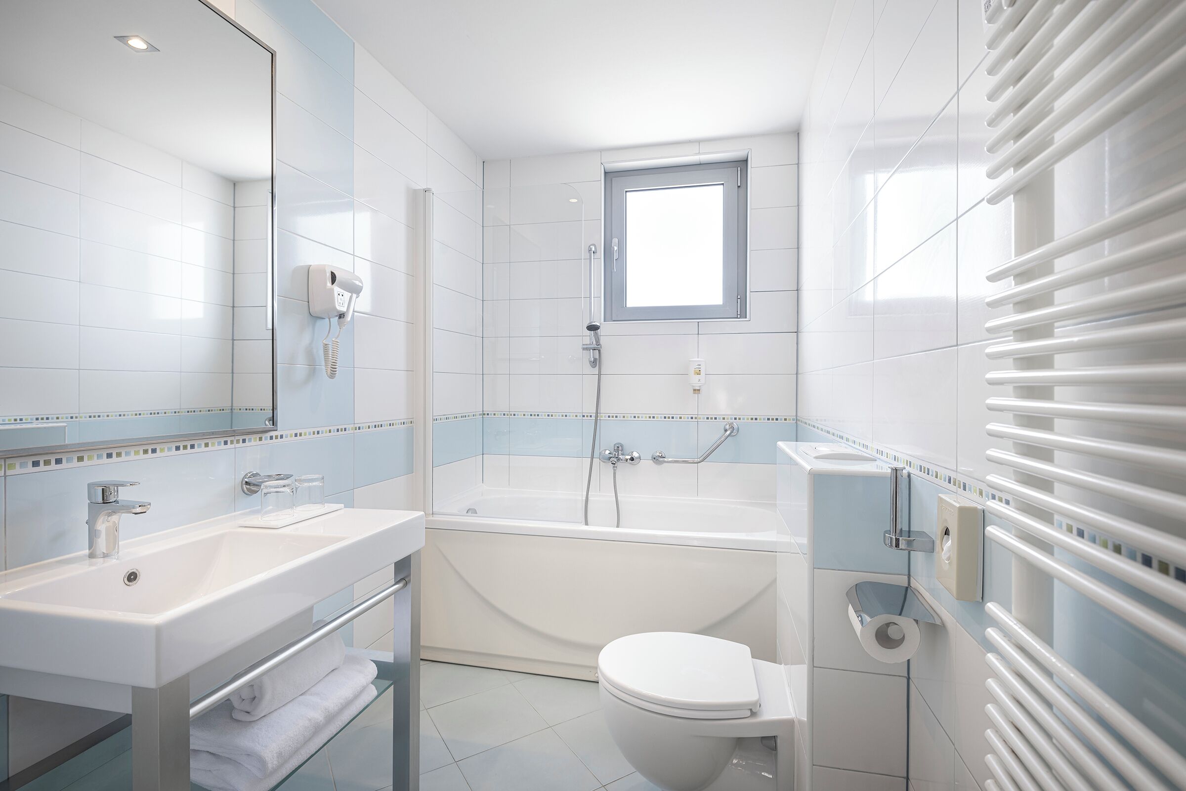 superior triple room | bathroom | free toiletries, hair dryer, towels