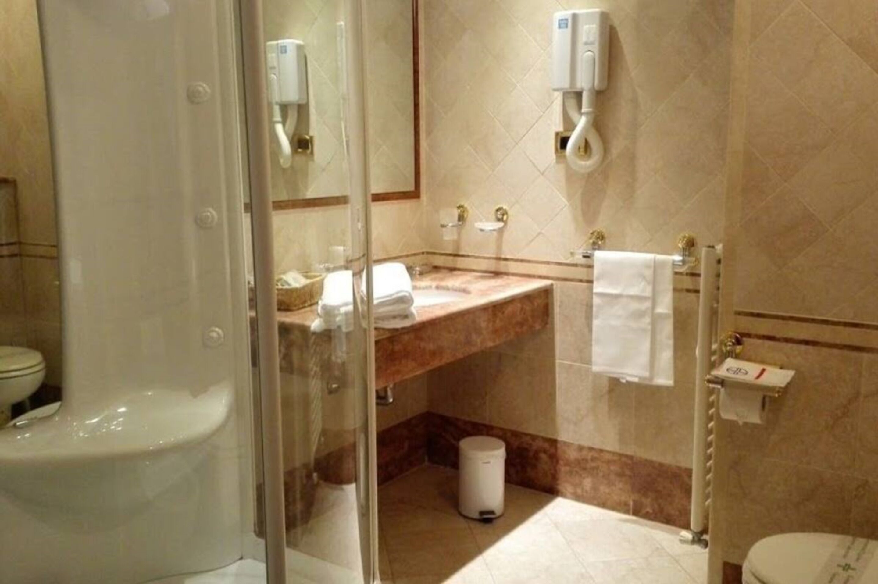 bathtub, jetted bath, hair dryer, slippers