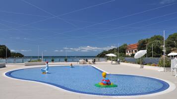 Indoor pool, outdoor pool, pool umbrellas, sun loungers