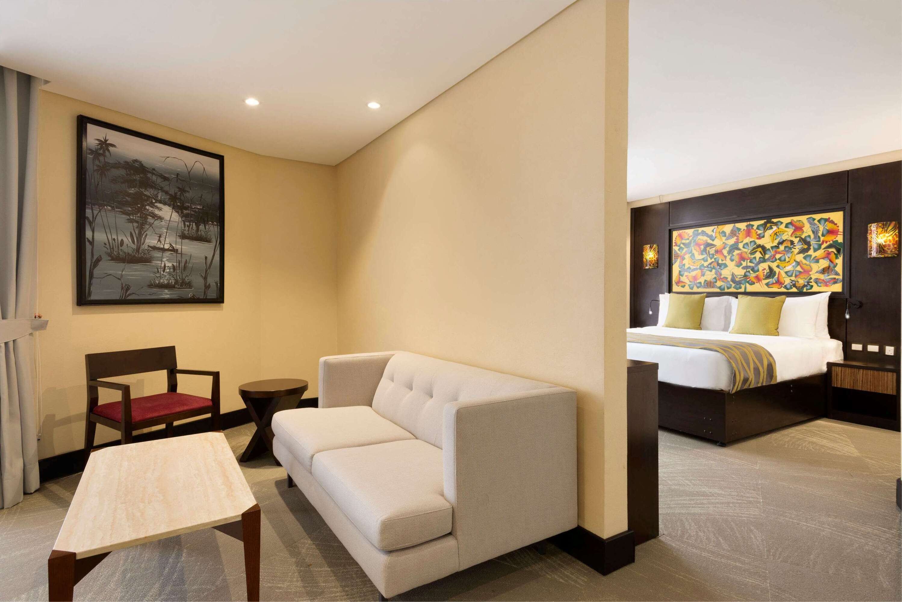 junior suite, 1 king bed, courtyard view (non smoking) | in-room safe, desk, soundproofing, iron/ironing board