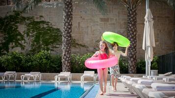 Seasonal outdoor pool, pool umbrellas, sun loungers