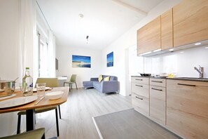 Two room apartment (excluding final cleaning fee) | Living area | Flat-screen TV - Aarehof Swiss Quality Hotel (Moeriken-Wildegg)