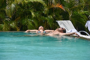 Outdoor pool, open 8:00 AM to 6:00 PM, free pool cabanas, pool umbrellas