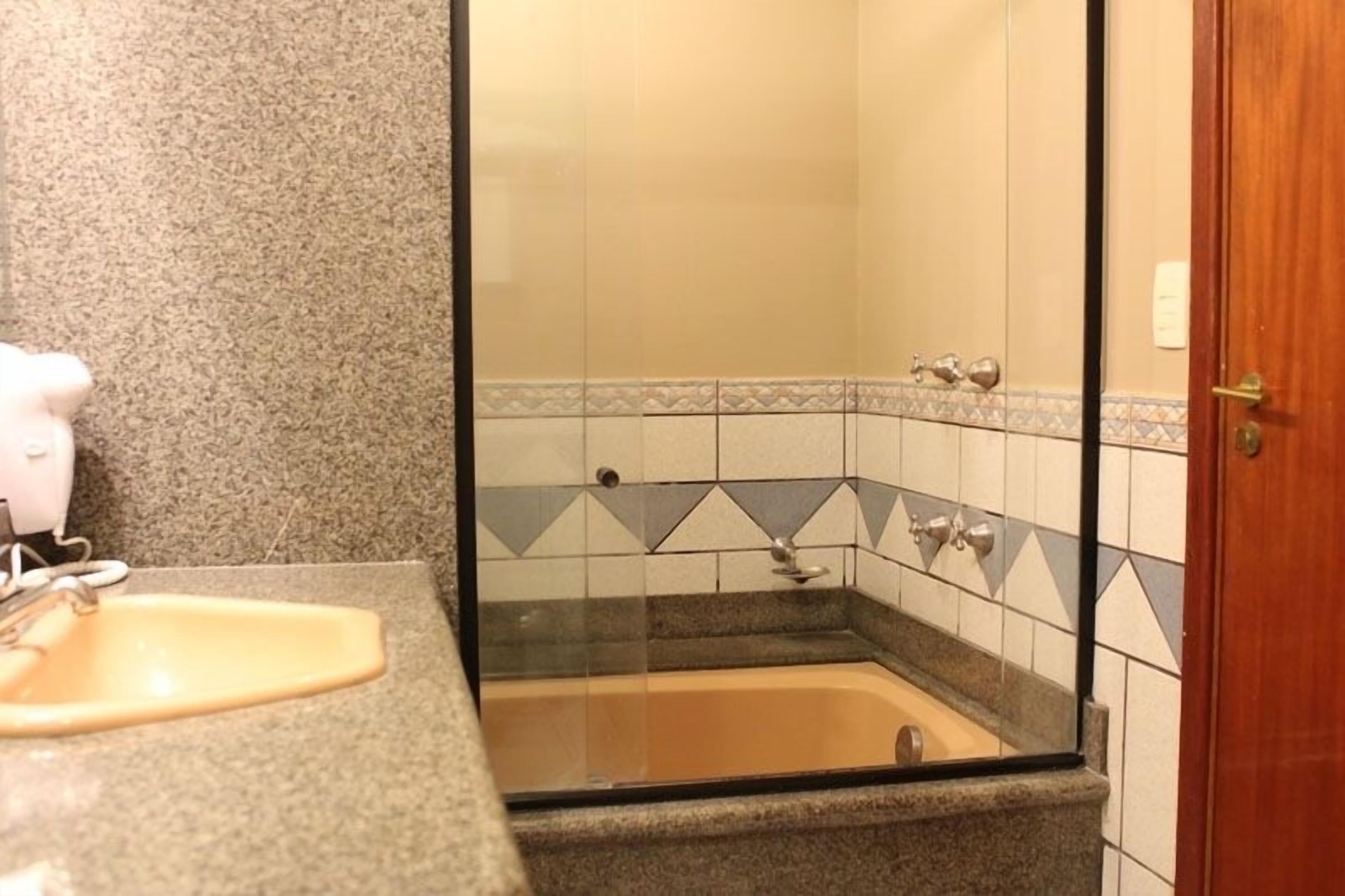 premium room (duplex) | bathroom | free toiletries, hair dryer, towels