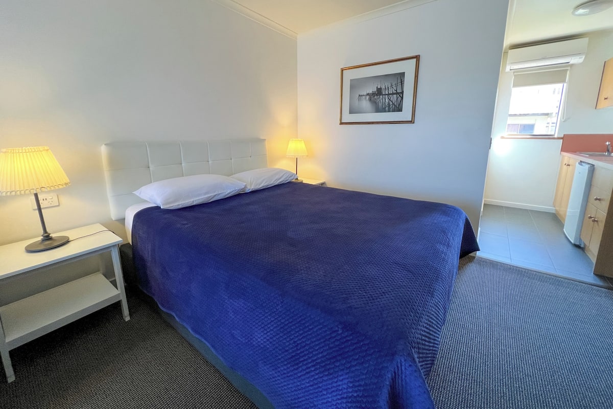 1 bedroom, desk, laptop workspace, iron/ironing board