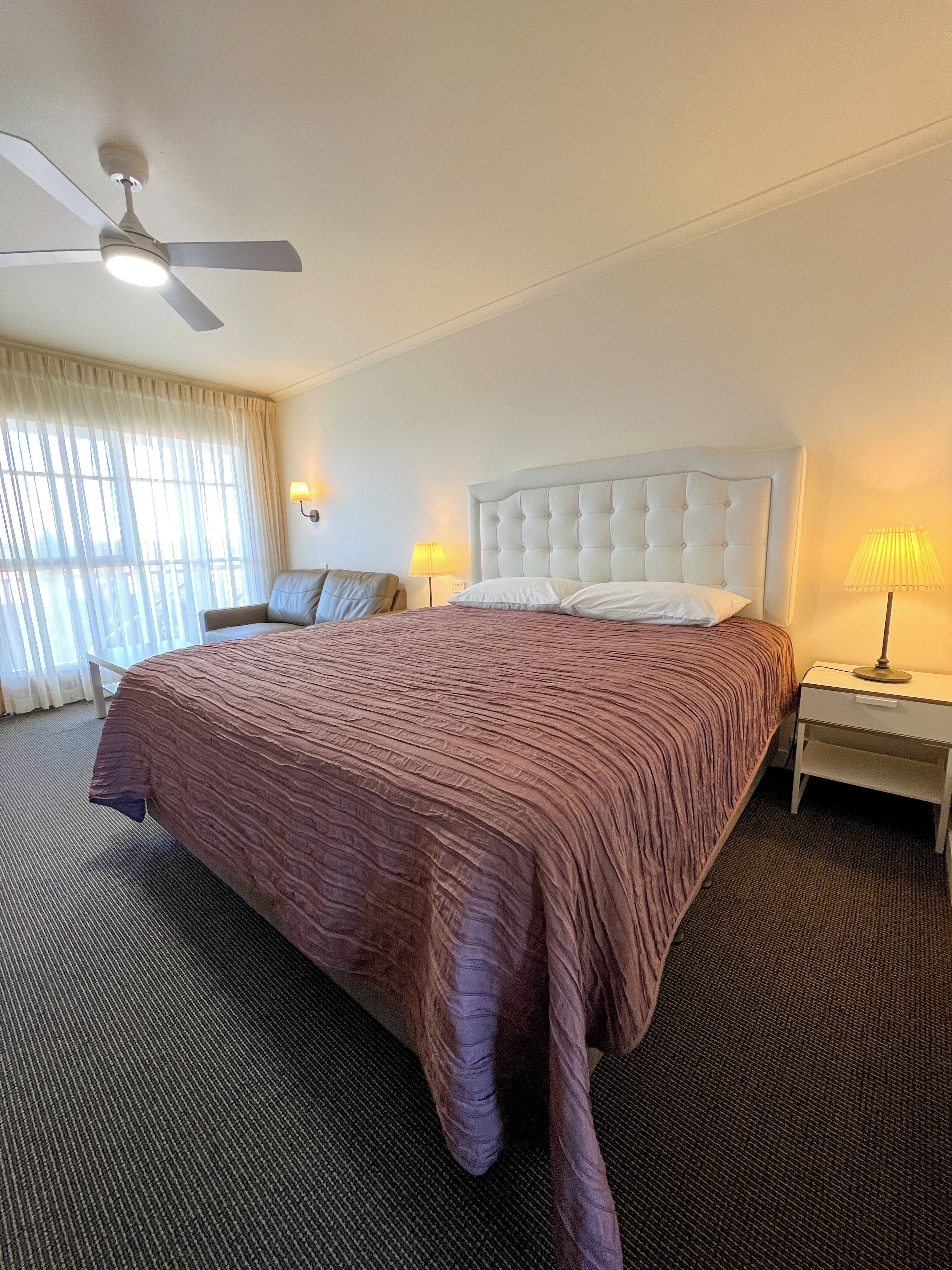 Premium Room, 1 King Bed, Kitchenette | Desk, laptop workspace, iron/ironing board, free WiFi