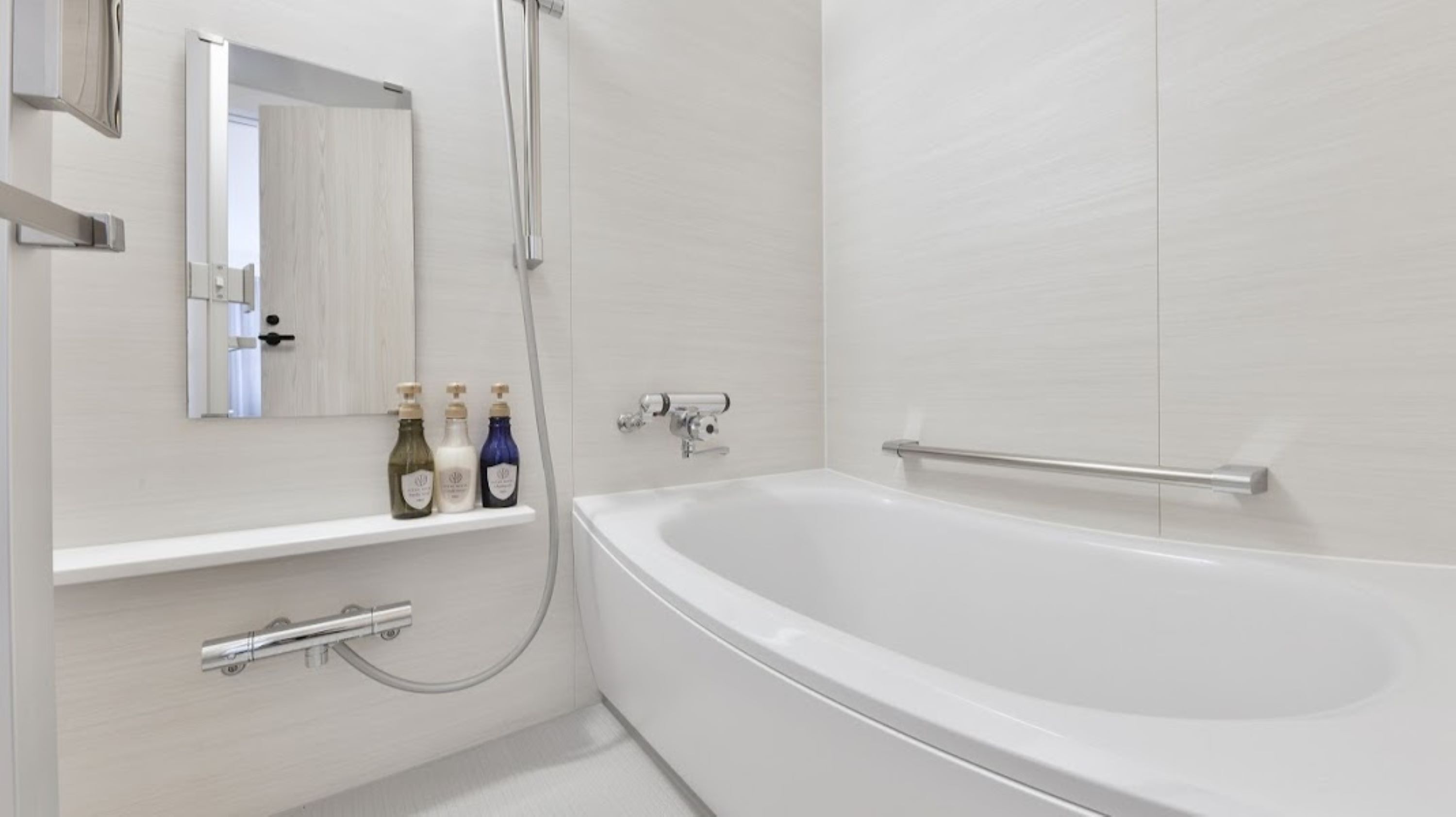 separate bathtub and shower, free toiletries, hair dryer, slippers