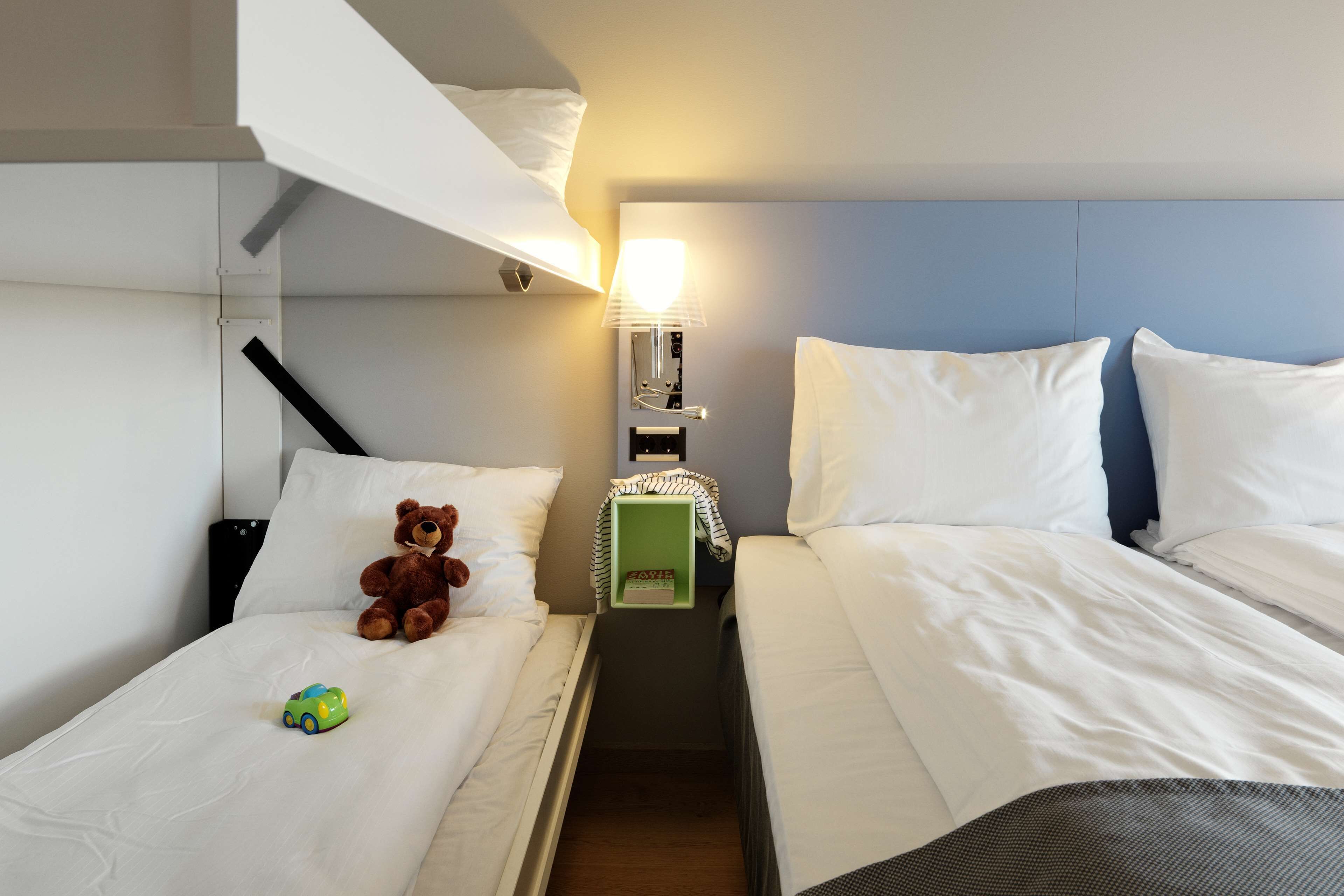 family room | premium bedding, in-room safe, desk, iron/ironing board