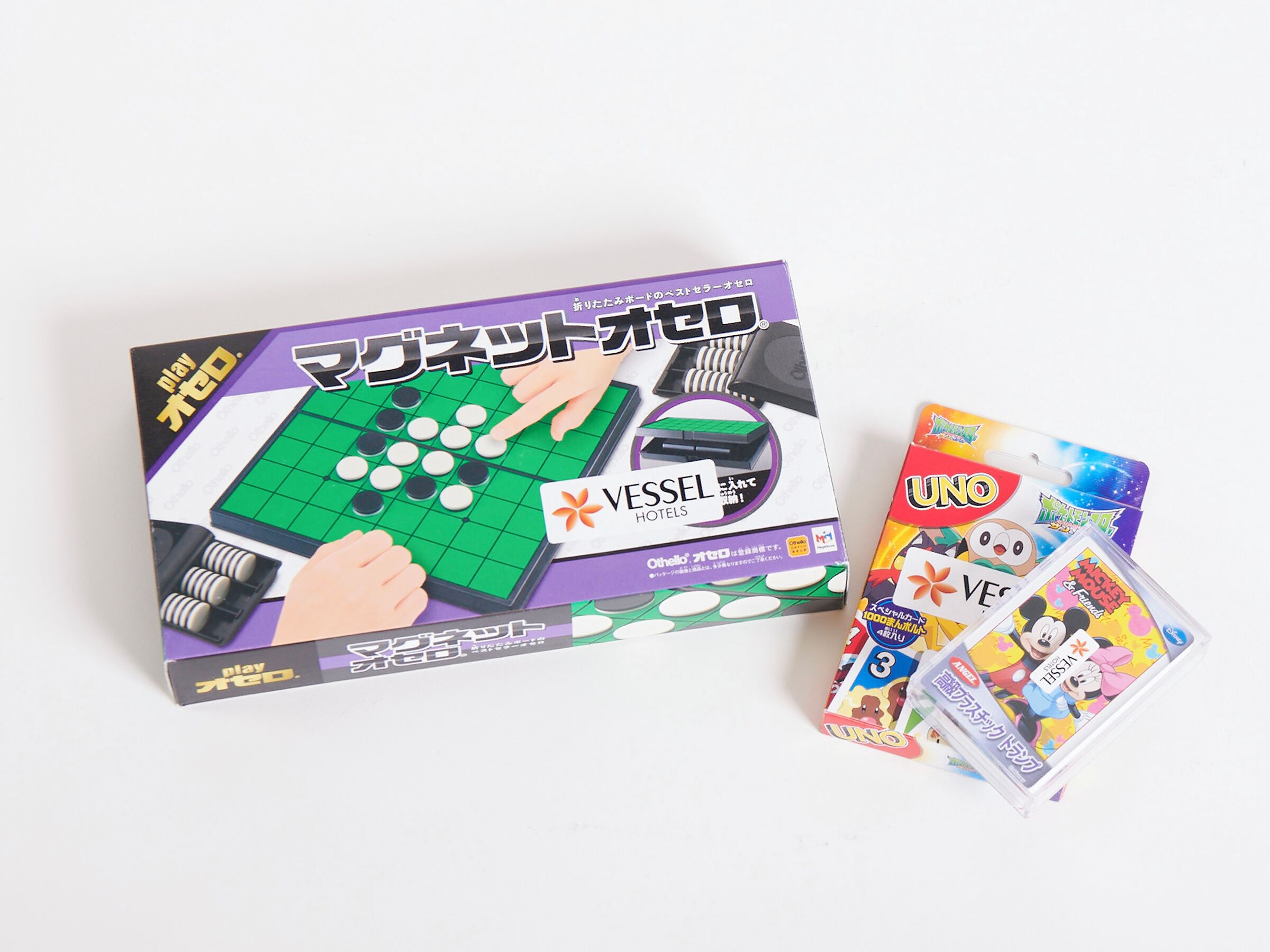 A board game set with a box and game pieces.