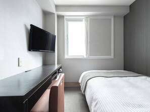 Desk, laptop workspace, free wired Internet, bed sheets
