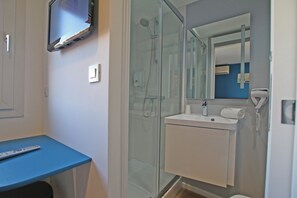 Shower, free toiletries, hair dryer, towels
