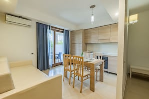 Appartamento, patio, vista giardino | Cucina privata