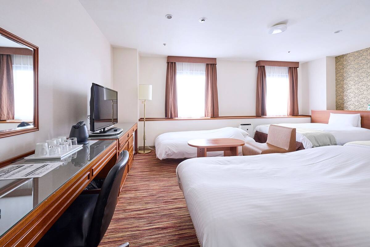 superior quadruple room, non smoking | 1 bedroom, desk, laptop workspace, blackout curtains