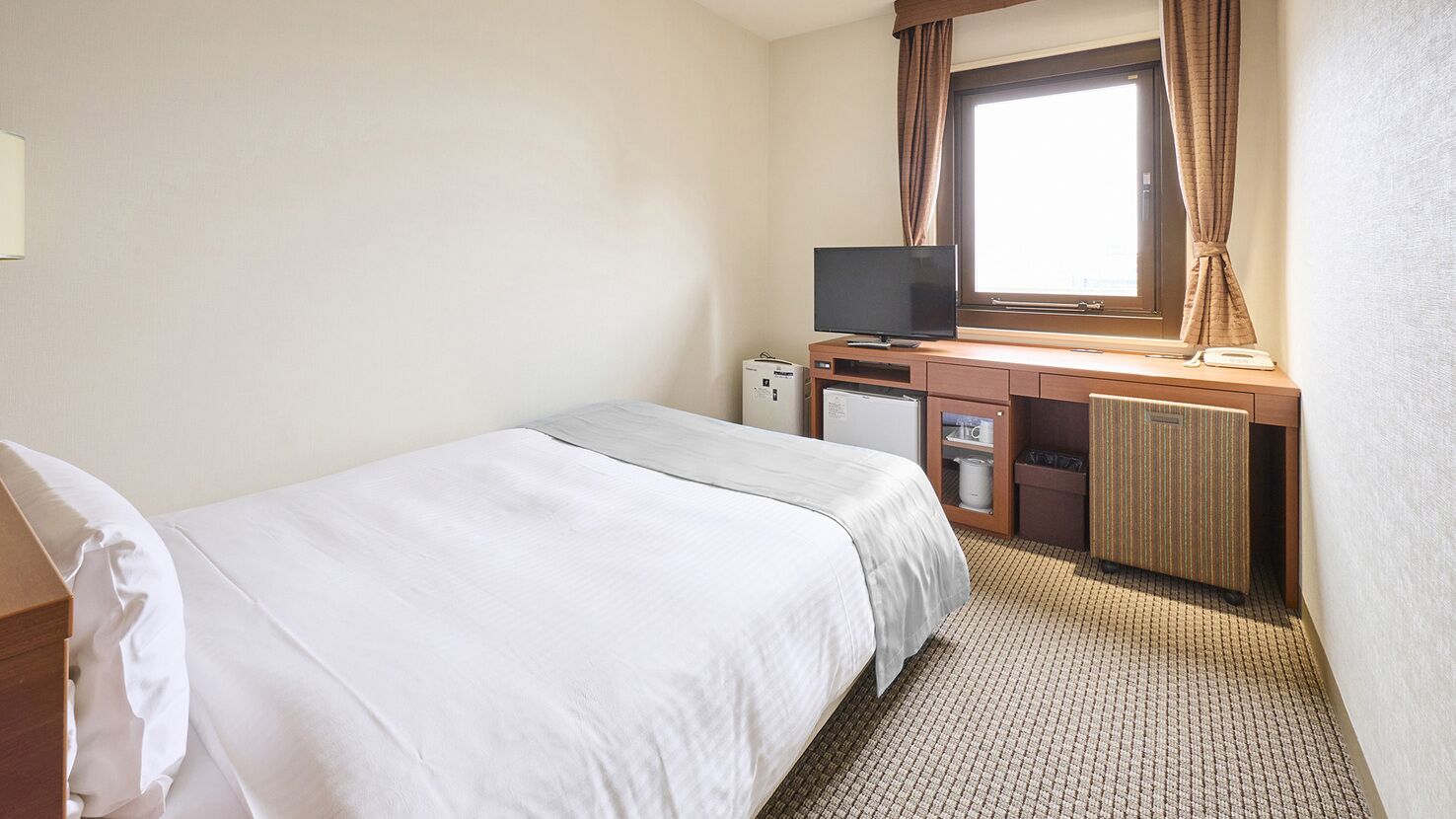 Desk, laptop workspace, blackout curtains, soundproofing