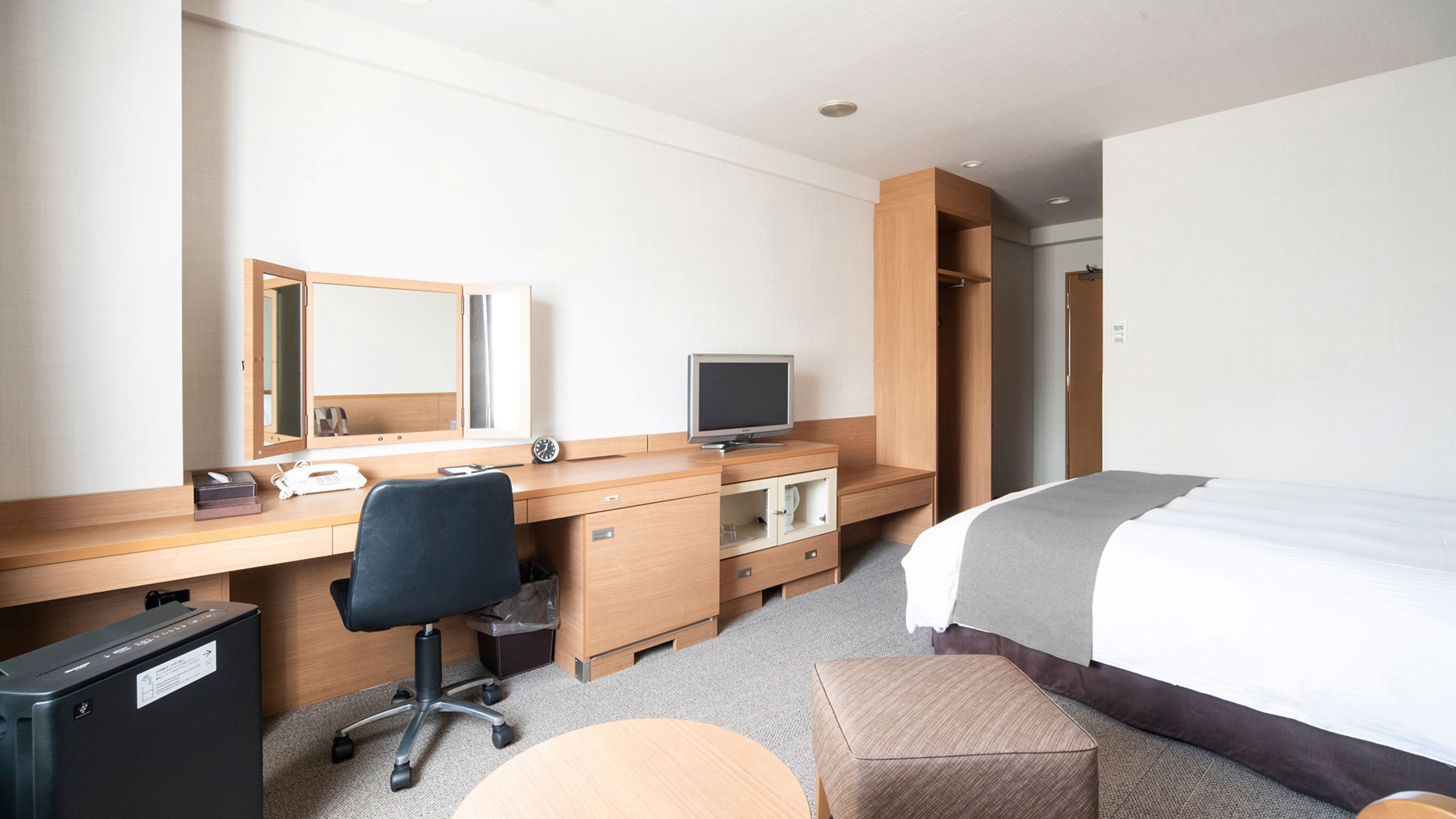 premium bedding, down duvets, desk, laptop workspace