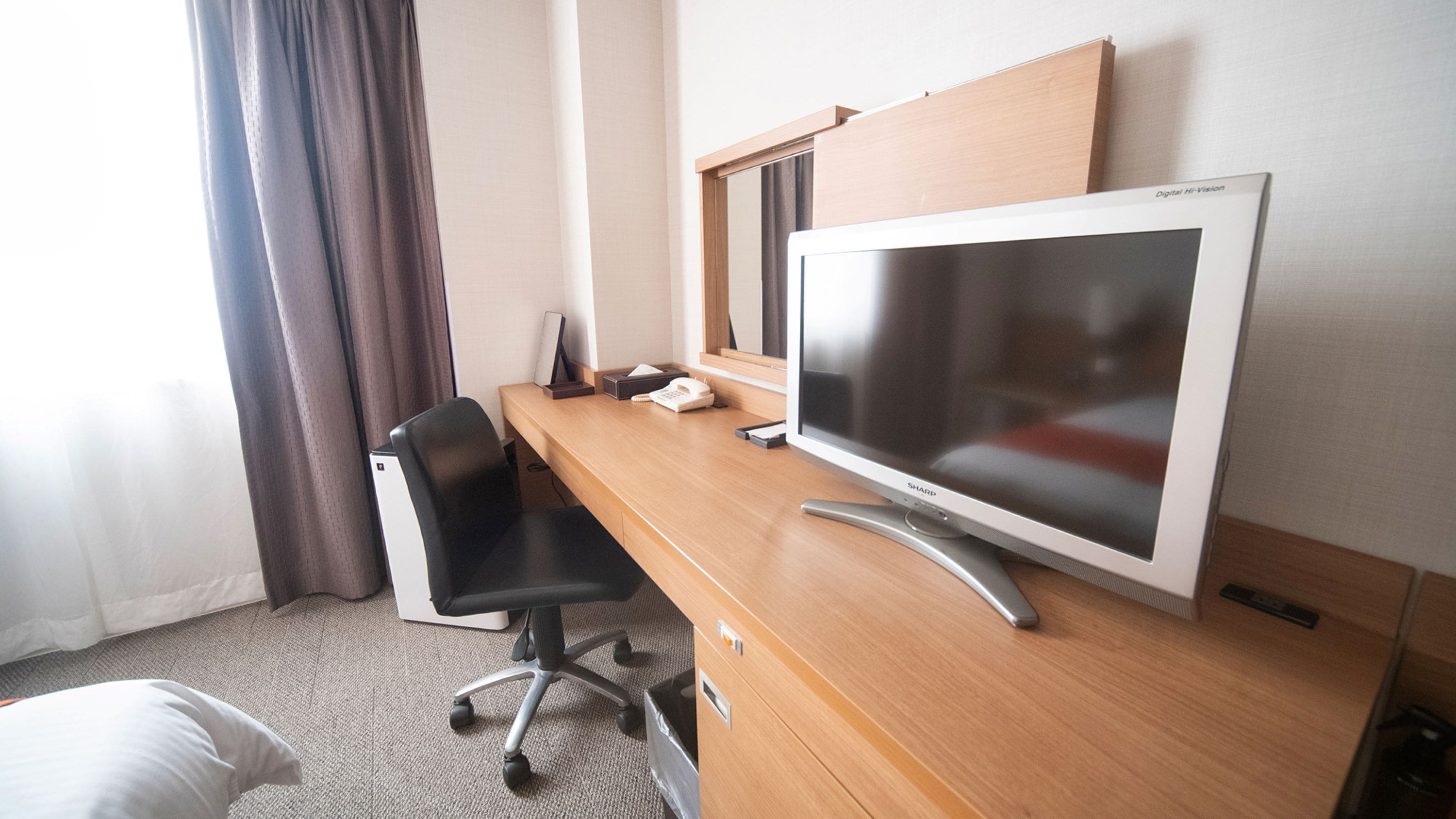 premium bedding, down duvets, desk, laptop workspace