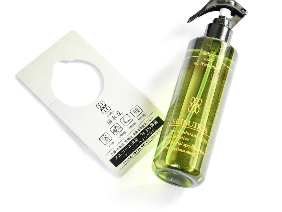A bottle of Seisuiika fabric and air freshener with a pump dispenser, and its packaging.