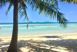 Beach nearby, white sand, sun loungers, beach umbrellas