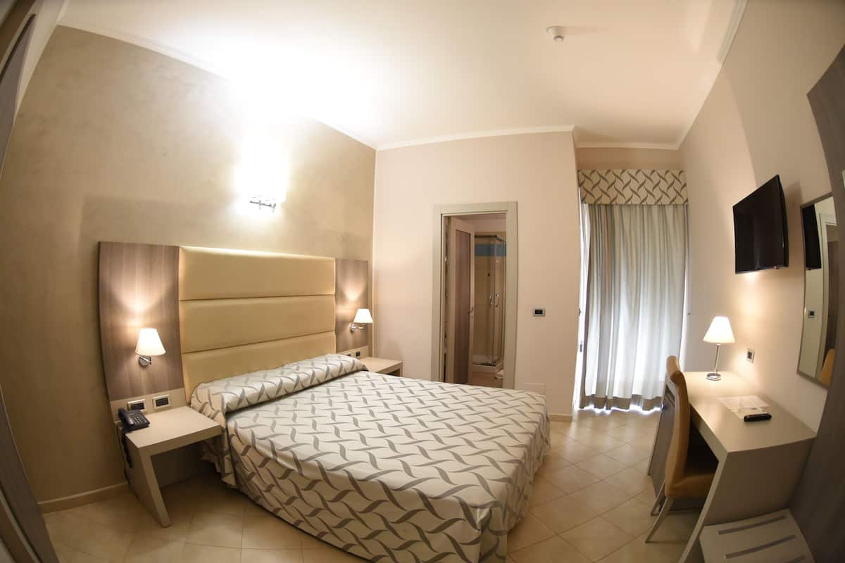 Ropa de cama de alta calidad y minibar