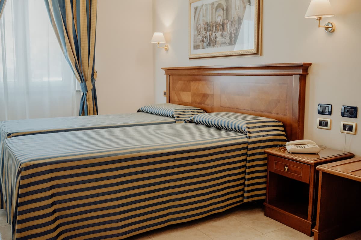 Ropa de cama de alta calidad y minibar