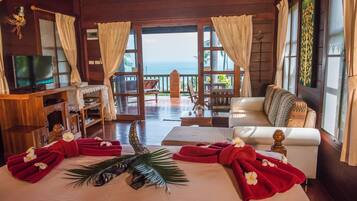 Classic Villa, 1 Bedroom, Ocean View | Premium bedding, in-room safe, desk, free cots/infant beds