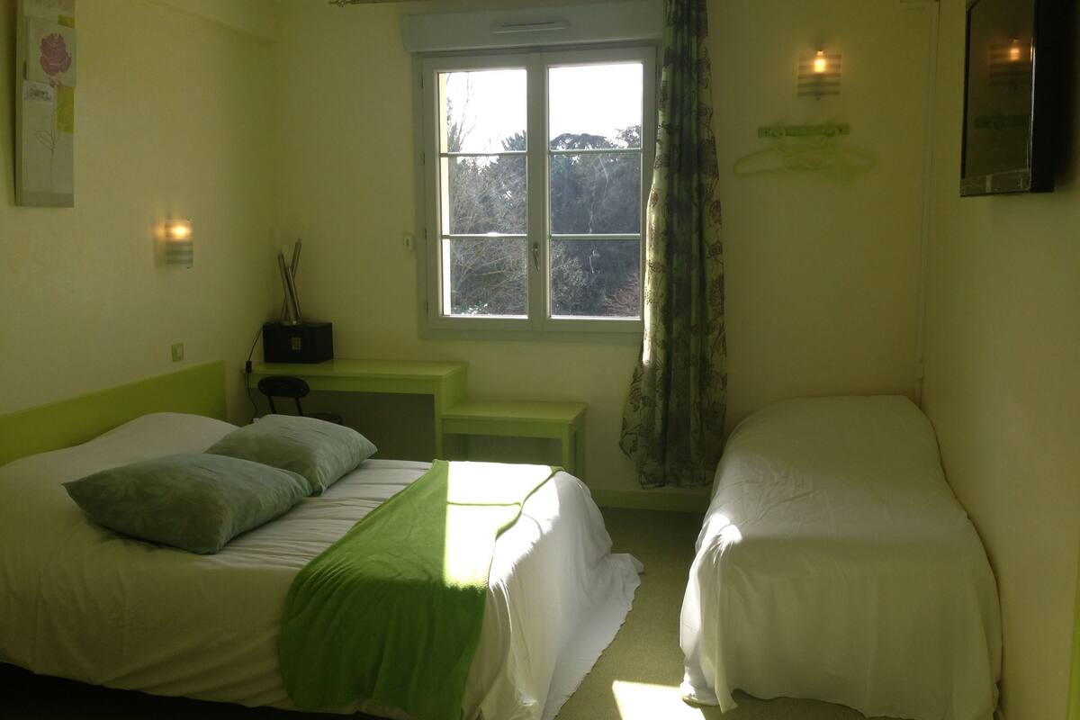Premium bedding, desk, laptop workspace, soundproofing