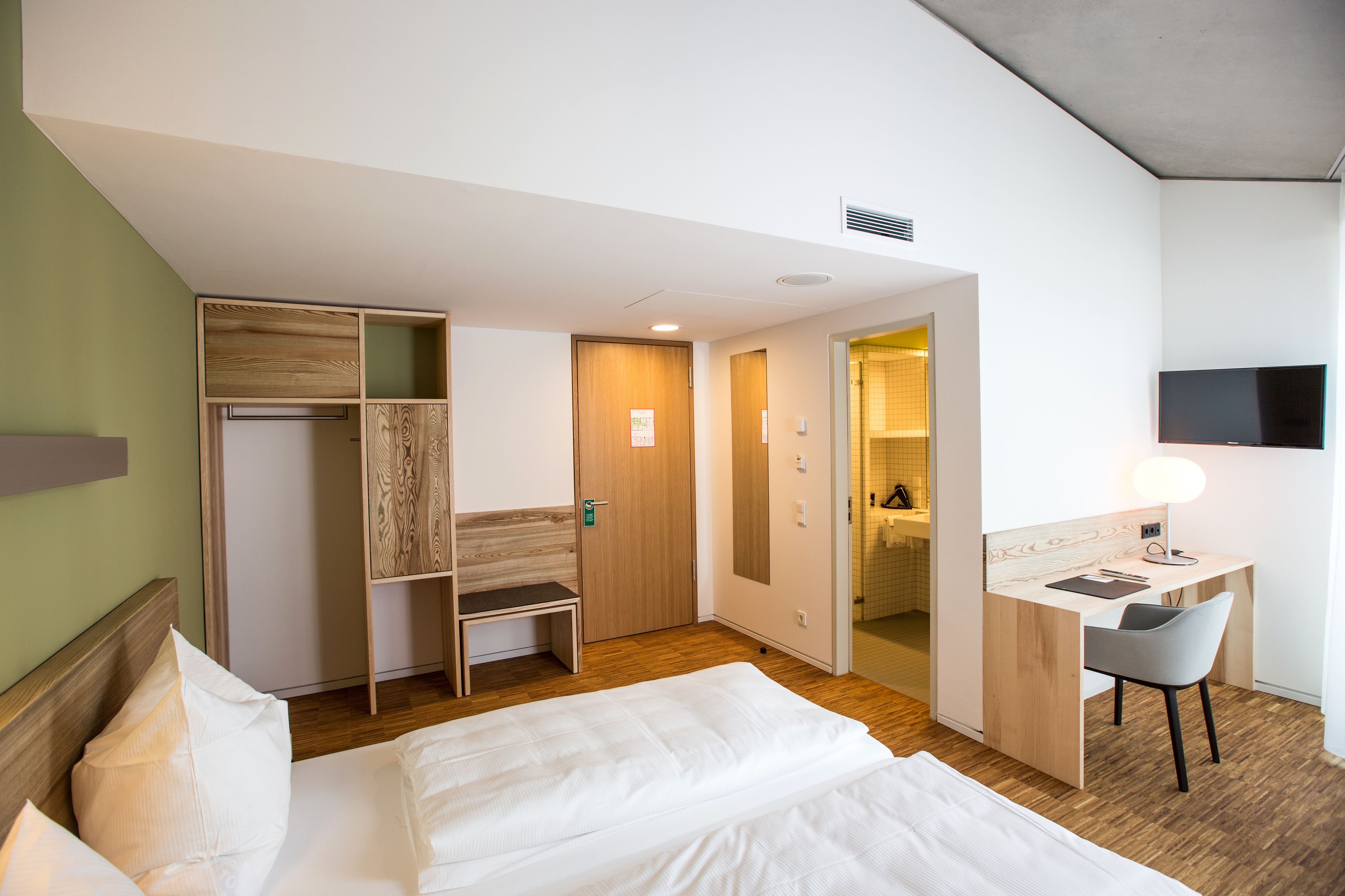 deluxe double room | hypo-allergenic bedding, in-room safe, desk, blackout curtains