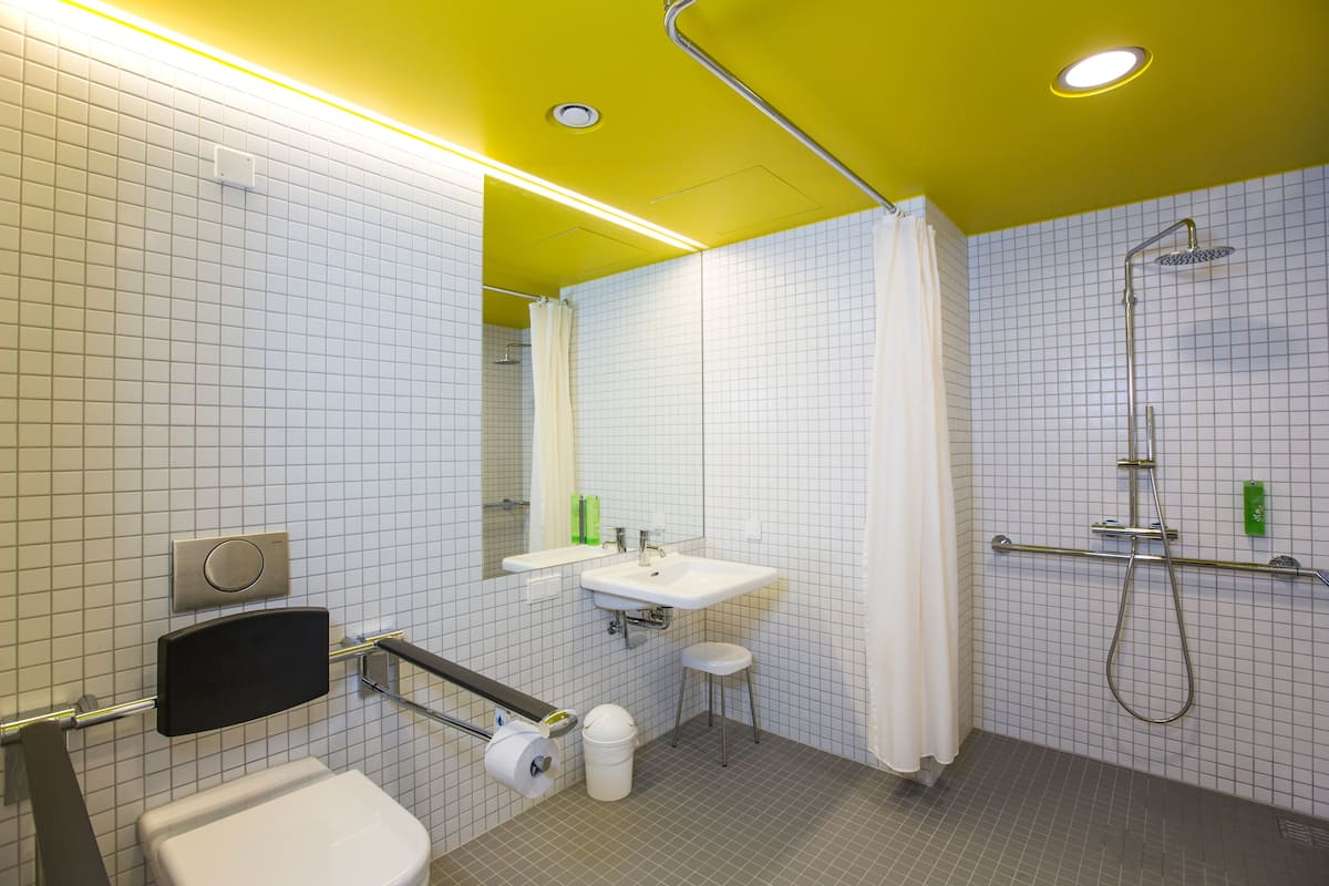 shower, rainfall showerhead, hair dryer, towels