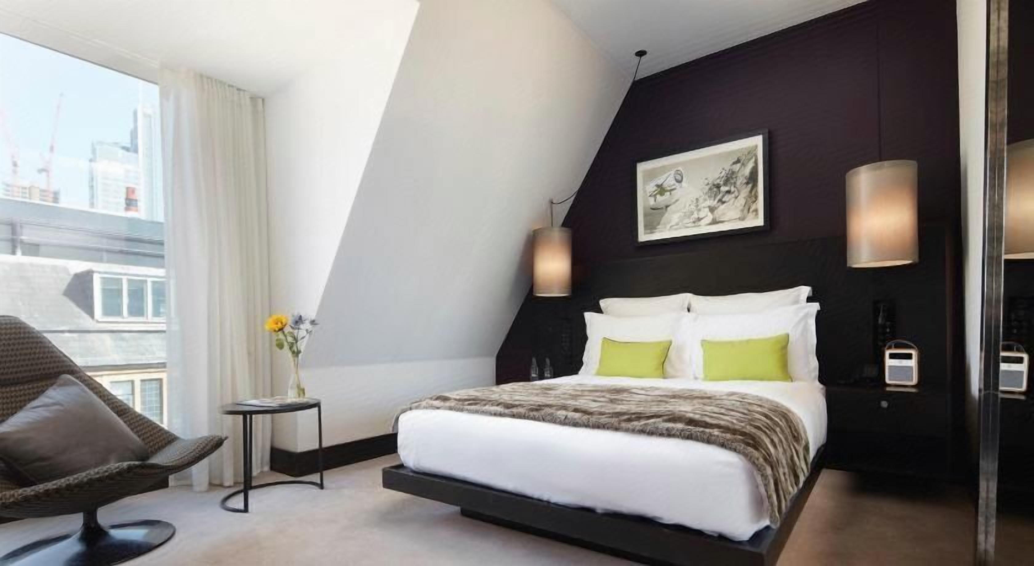 Hypo-allergenic bedding, down comforters, minibar, in-room safe