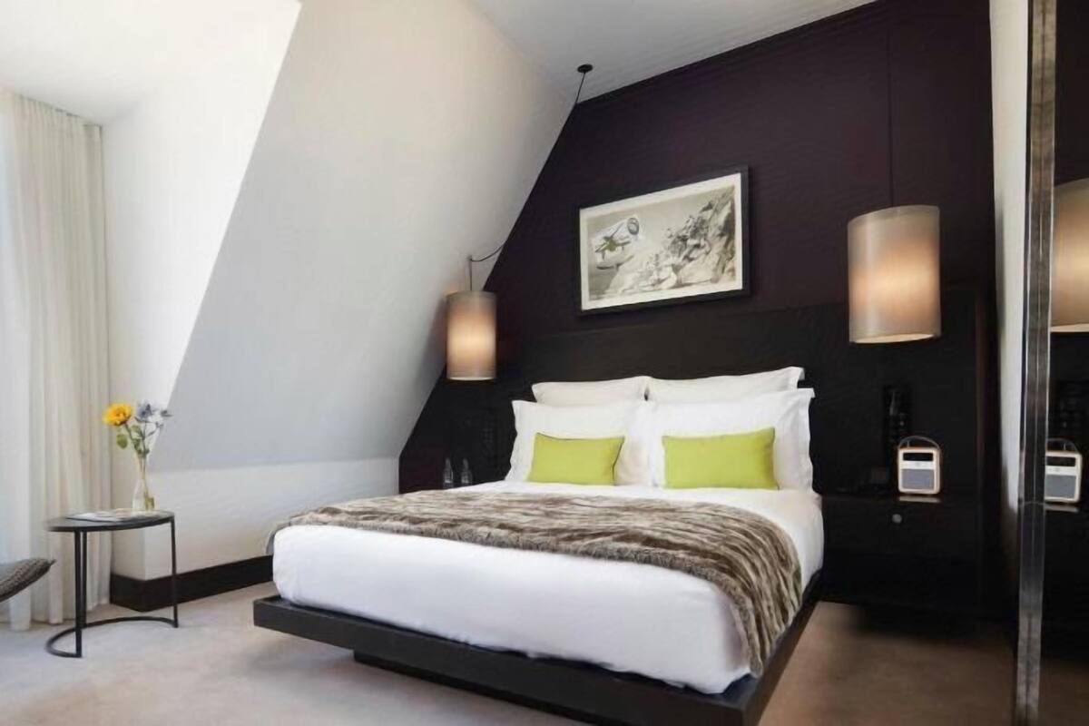 Hypo-allergenic bedding available, down comforters, minibar