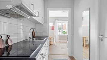 Apartment, 1 Bedroom | Private kitchen | Full-size fridge, microwave, dishwasher, paper towels