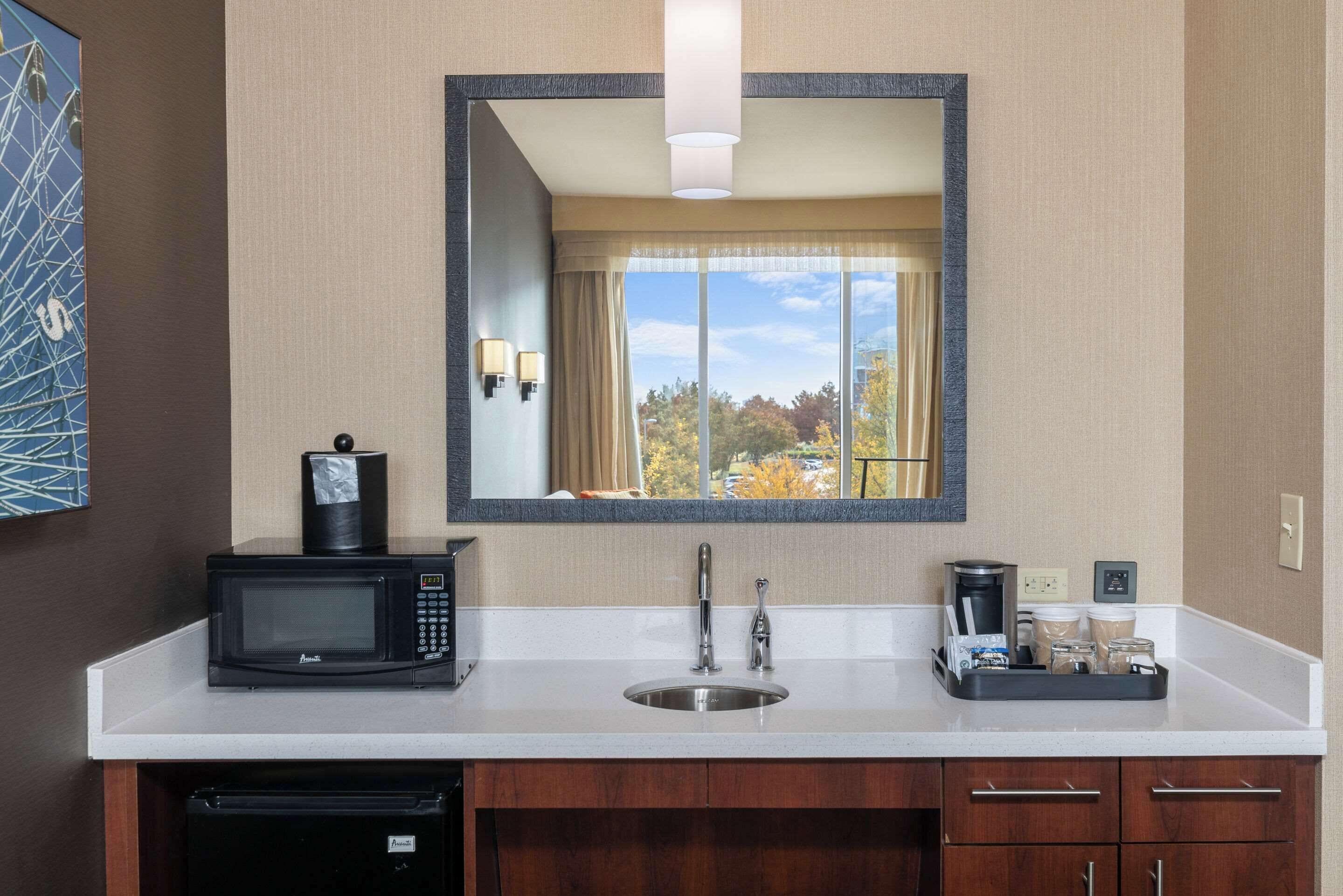 suite, 1 king bed with sofa bed, accessible, non smoking | in-room safe, desk, iron/ironing board, free wifi