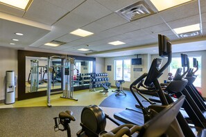 A gym with treadmills, exercise bikes, and free weights. - Hilton Garden Inn Lawton-Fort Sill (Lawton)
