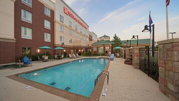 Seasonal outdoor pool, pool umbrellas, pool loungers