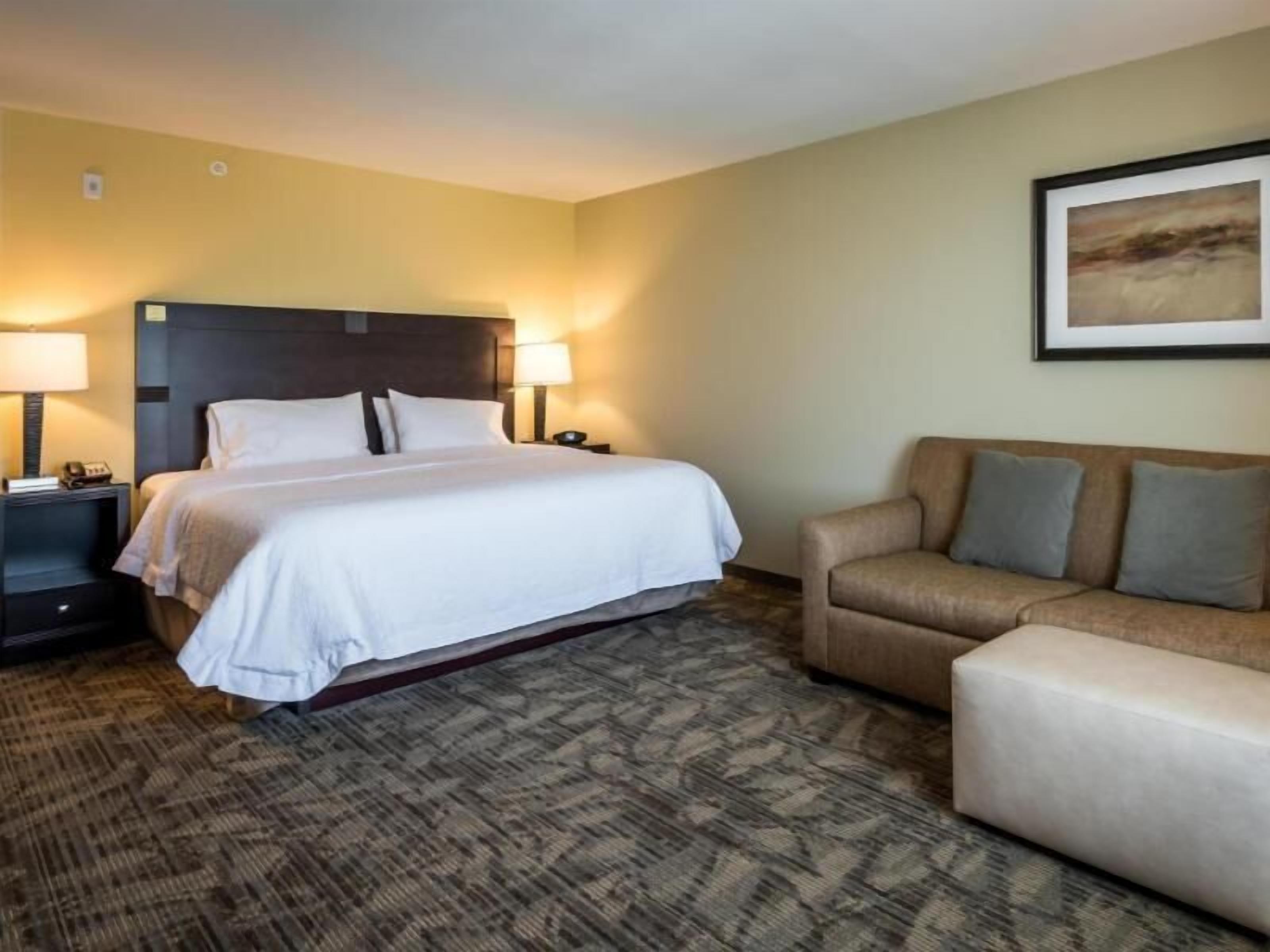 Desk, blackout drapes, iron/ironing board, free cribs/infant beds