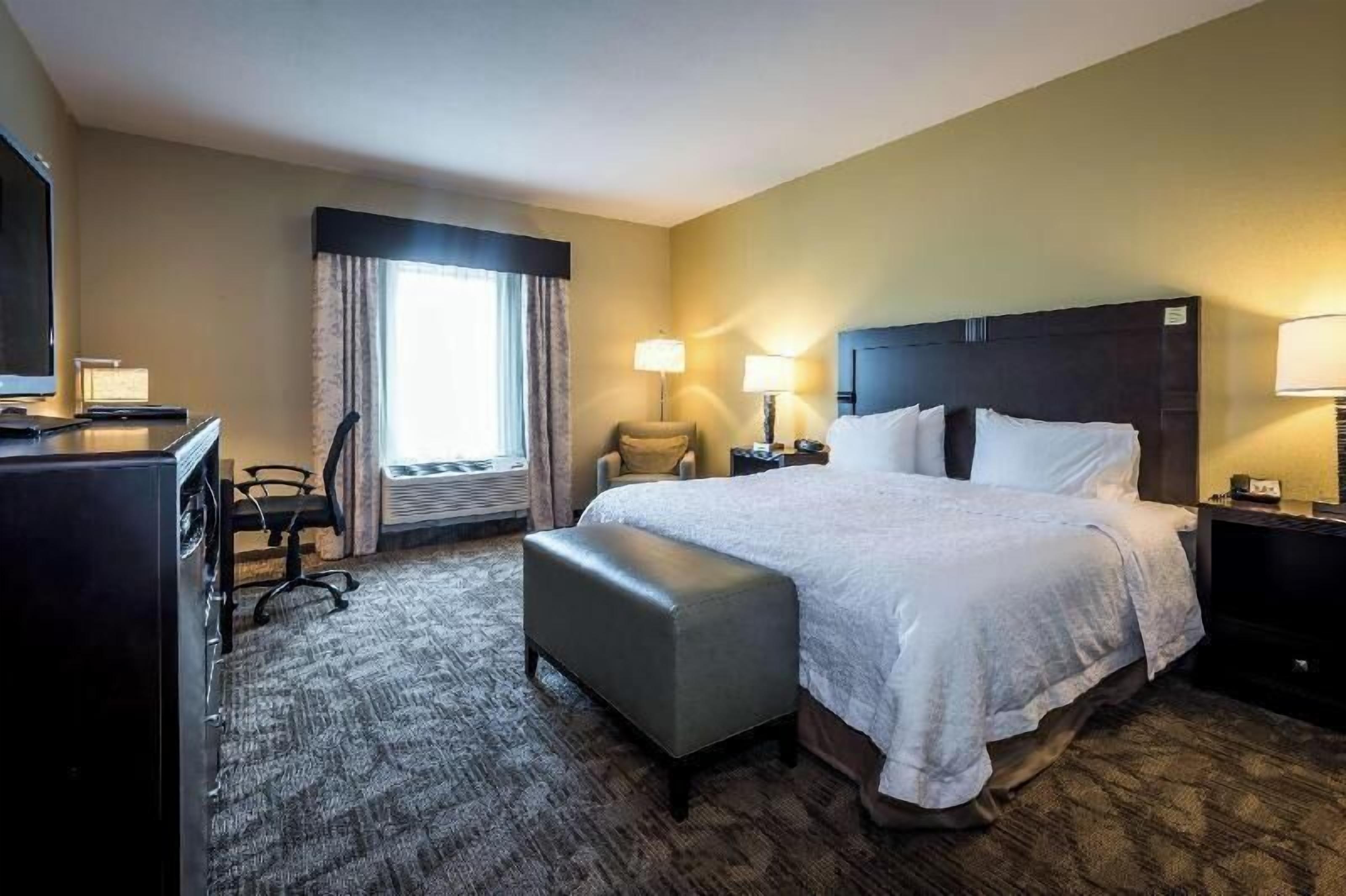 Desk, blackout drapes, iron/ironing board, free cribs/infant beds