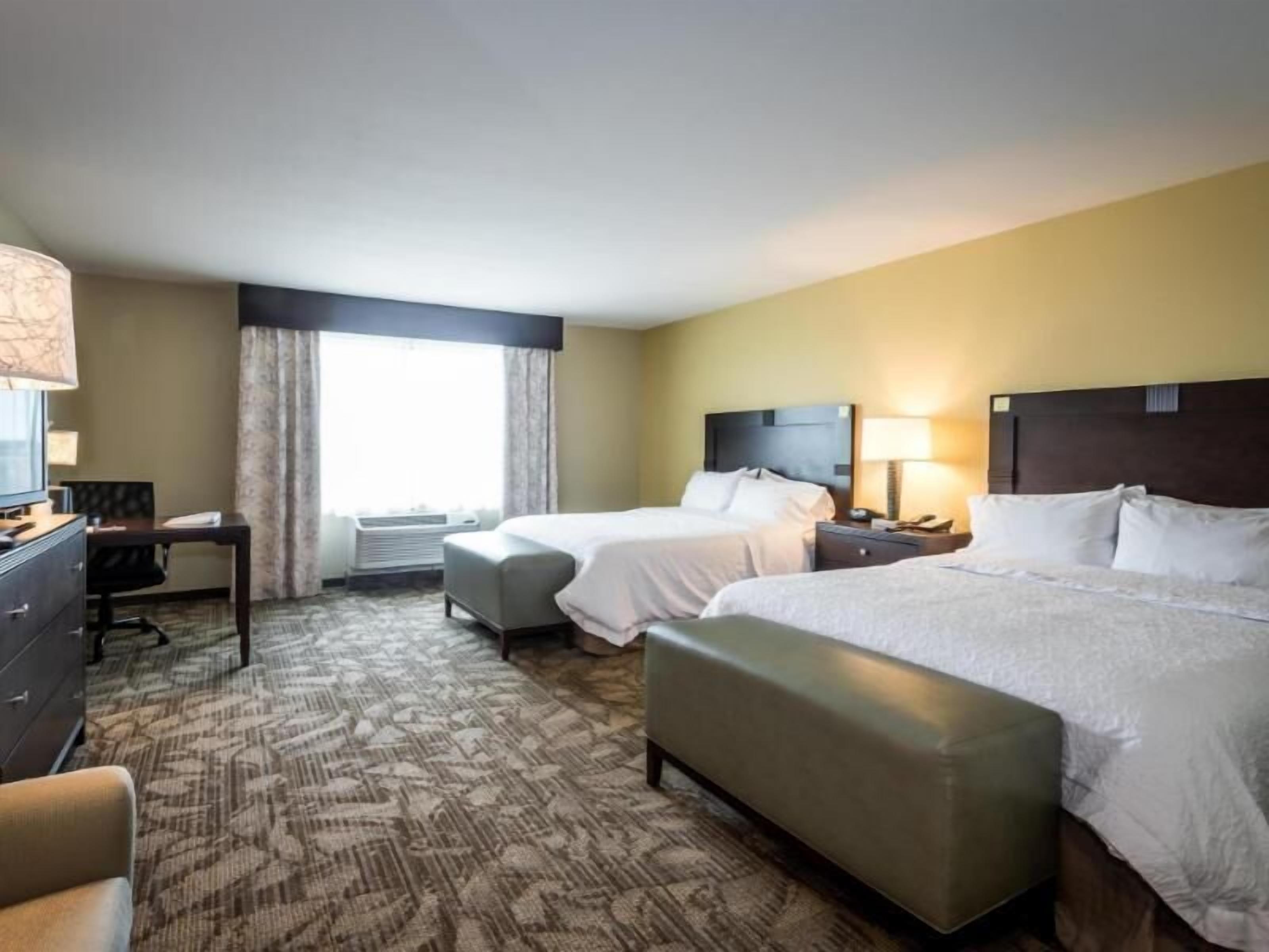 Desk, blackout drapes, iron/ironing board, free cribs/infant beds