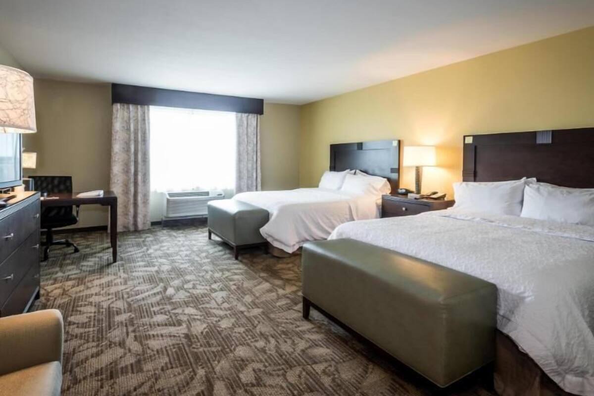 Desk, blackout drapes, iron/ironing board, free cribs/infant beds