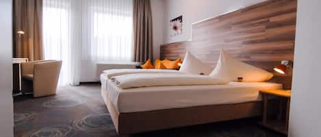 Ropa de cama hipoalergénica, decoración personalizada y escritorio